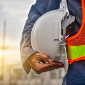 engineer holding hard hat construction worker professional safety work industry building person manager service