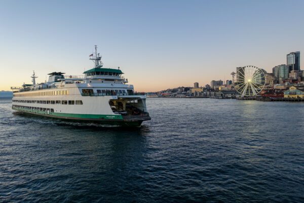 A,Washington,State,Ferry,Approaches,Downtown,Seattle,After,Sailing,Across